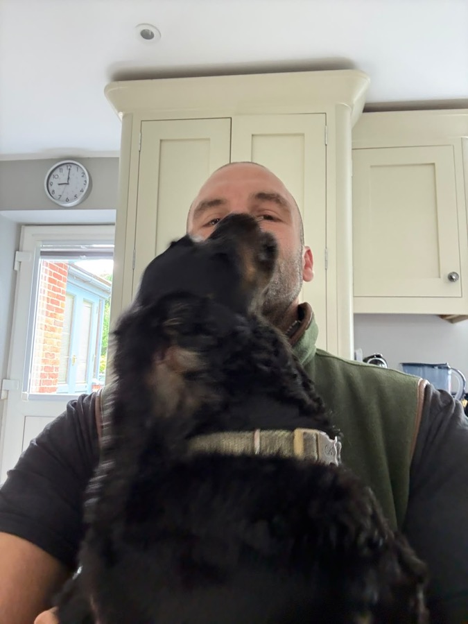 Rob with a dog during a home visit